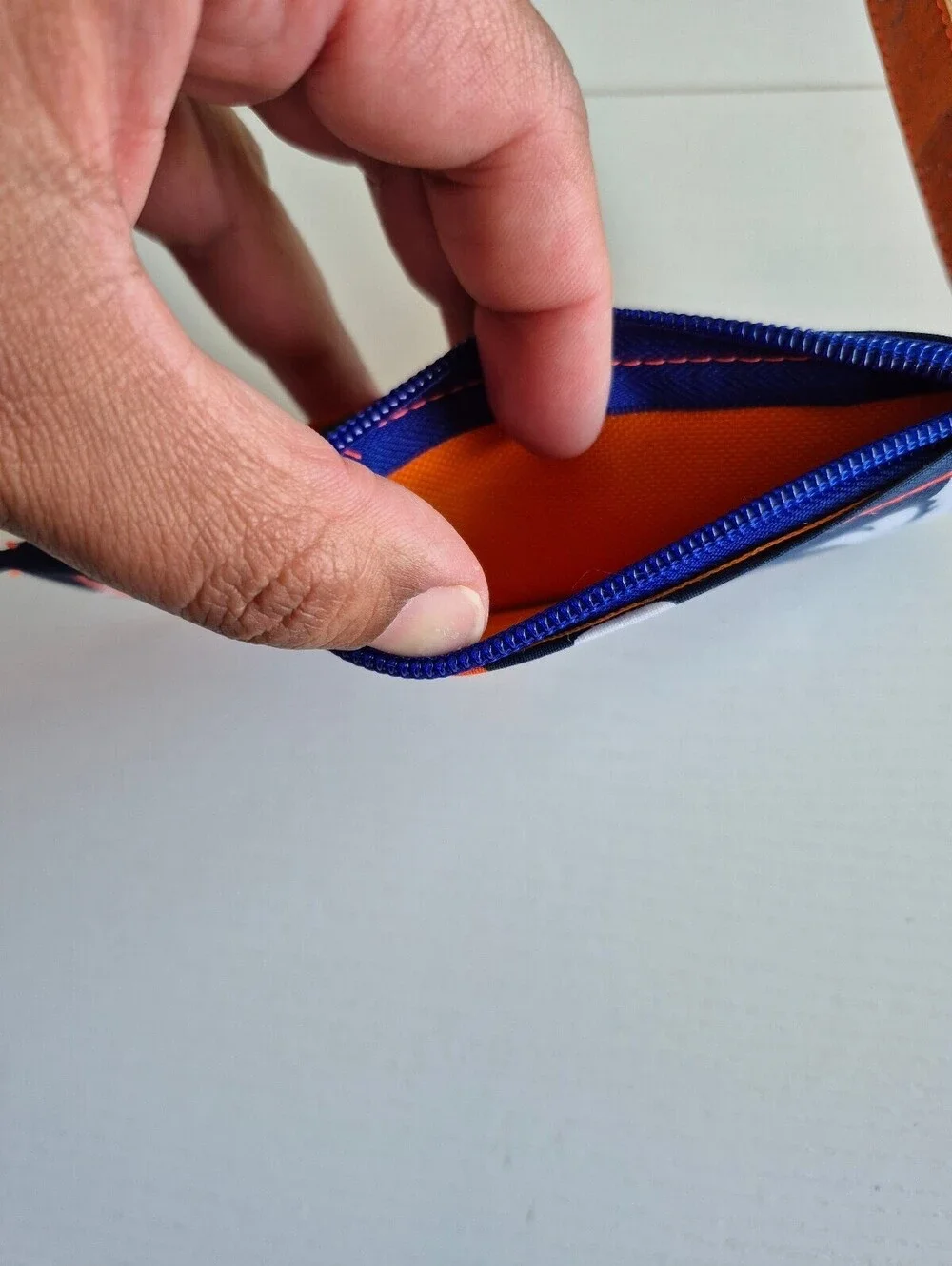 football wallet orange and blue magnetic snap tab 6 card slot wallet